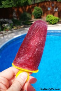 Want a fun boozy summer popsicle for the adults at your party? These Sangria Popsicles are the bomb! Red wine, fresh berries and bourbon combine into the perfect frozen cocktail recipe for mom! #sangria #popsicles #boozypopsicles #sangriarecipe #icepops
