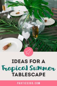 Want to set a beautiful outdoor dining table for a summer party? You'll love this simple tablescape featuring a palm leaf centerpiece and tropical decor! Click through to see all the summery tabletop decorations! #summerparty #outdoordining #tablescape #centerpiece #tropical