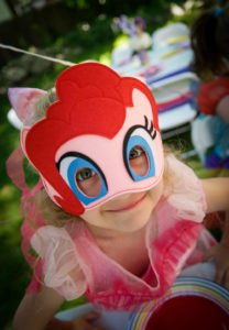 Throw a fabulous My Little Pony Birthday Party for your daughter and her friends with these ideas for a backyard, DIY celebration! Find inspiration for decorations, cake, food, banner, favors and more in this rainbow colored pony party! #mylittlepony #birthdayparty #partyideas #mylittleponyparty