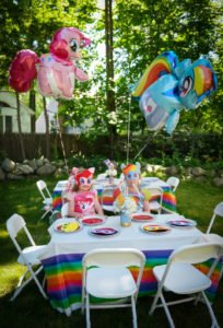 Throw a fabulous My Little Pony Birthday Party for your daughter and her friends with these ideas for a backyard, DIY celebration! Find inspiration for decorations, cake, food, banner, favors and more in this rainbow colored pony party! #mylittlepony #birthdayparty #partyideas #mylittleponyparty