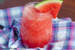 Want an easy, fresh recipe for a Watermelon Cocktail this summer? Our Watermelon Moscato Slushie is the perfect white wine frozen slush! Just fill a pitcher, pour it out for a crowd and watch everyone enjoy! #watermelon #winecocktail #summercocktailrecipe #slushie