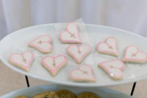 This simple Baptism party at home has ideas for lovely decorations with a beautiful backdrop that will work for a boy or a girl. Create an elegant dessert or food table your guests will adore! #baptism #baptismideas #partydecor #baptismparty