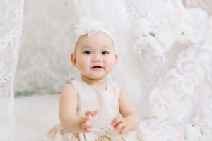 This simple Baptism party at home has ideas for lovely decorations with a beautiful backdrop that will work for a boy or a girl. Create an elegant dessert or food table your guests will adore! #baptism #baptismideas #partydecor #baptismparty