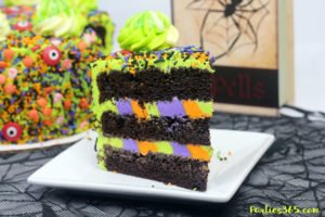 This easy and fun Halloween Monster Cake is a cute idea for kids this fall! Our DIY recipe is simple to follow and you'll create a spooky and amazing monster cake everyone will adore! #Halloween #halloweenrecipes #halloweencake #monster #monstercake