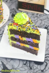 This easy and fun Halloween Monster Cake is a cute idea for kids this fall! Our DIY recipe is simple to follow and you'll create a spooky and amazing monster cake everyone will adore! #Halloween #halloweenrecipes #halloweencake #monster #monstercake