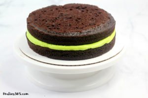 This easy and fun Halloween Monster Cake is a cute idea for kids this fall! Our DIY recipe is simple to follow and you'll create a spooky and amazing monster cake everyone will adore! #Halloween #halloweenrecipes #halloweencake #monster #monstercake