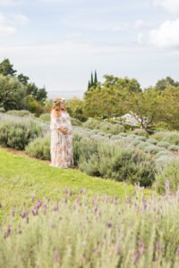 This Little Pumpkin themed Baby Shower is perfect for fall and works for a baby girl or a boy! Held on a stunning lavender farm in Hawaii, this autumn baby shower has lovely decorations, food, cookie favors and a cake to inspire your party planning! #babyshower #littlepumpkin #fallparty #pumpkinshower #partydecor
