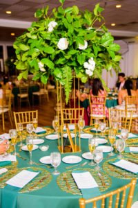 Planning a quinceañera and need ideas for fabulous decorations, themes or dresses? You'll adore this non-traditional emerald green quinceanera with bright colors, dress and lovely centerpieces! #quinceanera #15thbirthday #quinceañera #emeraldgreen #birthdayideas