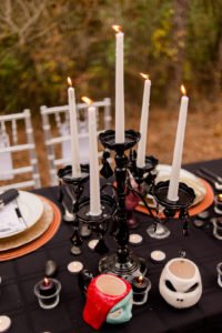This Jack and Sally, Nightmare Before Christmas inspired Halloween Tablescape is full of decoration ideas for your spooky party or event! With Halloween table settings, centerpieces and display ideas, you'll love recreating this unique table for your guests! #JackandSally #NightmareBeforeChristmas #halloween #tablescape