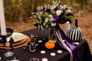 This Jack and Sally, Nightmare Before Christmas inspired Halloween Tablescape is full of decoration ideas for your spooky party or event! With Halloween table settings, centerpieces and display ideas, you'll love recreating this unique table for your guests! #JackandSally #NightmareBeforeChristmas #halloween #tablescape