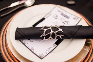 This Jack and Sally, Nightmare Before Christmas inspired Halloween Tablescape is full of decoration ideas for your spooky party or event! With Halloween table settings, centerpieces and display ideas, you'll love recreating this unique table for your guests! #JackandSally #NightmareBeforeChristmas #halloween #tablescape