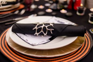 This Jack and Sally, Nightmare Before Christmas inspired Halloween Tablescape is full of decoration ideas for your spooky party or event! With Halloween table settings, centerpieces and display ideas, you'll love recreating this unique table for your guests! #JackandSally #NightmareBeforeChristmas #halloween #tablescape