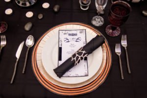 This Jack and Sally, Nightmare Before Christmas inspired Halloween Tablescape is full of decoration ideas for your spooky party or event! With Halloween table settings, centerpieces and display ideas, you'll love recreating this unique table for your guests! #JackandSally #NightmareBeforeChristmas #halloween #tablescape