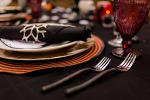 This Jack and Sally, Nightmare Before Christmas inspired Halloween Tablescape is full of decoration ideas for your spooky party or event! With Halloween table settings, centerpieces and display ideas, you'll love recreating this unique table for your guests! #JackandSally #NightmareBeforeChristmas #halloween #tablescape