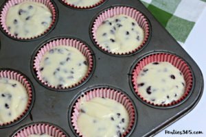 Need creative cupcake ideas for your next birthday party? You'll adore this delicious Milk and Cookies Cupcake Recipe! A vanilla chocolate chip cupcake with cookie dough decoration, this dessert is sure to be a hit with your guests! #cupcakes #cookiedough #chocolatechip #recipes #birthdayideas