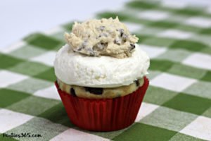 Need creative cupcake ideas for your next birthday party? You'll adore this delicious Milk and Cookies Cupcake Recipe! A vanilla chocolate chip cupcake with cookie dough decoration, this dessert is sure to be a hit with your guests! #cupcakes #cookiedough #chocolatechip #recipes #birthdayideas