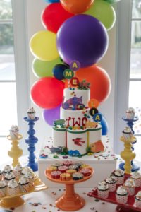 This darling 2nd birthday party featured a Brown Bear Brown Bear by Eric Carle theme! With vibrant colorful decorations, giant animals and amazing cake and cupcakes, it's full of fabulous ideas to bring this book to life! #brownbear #ericcarle #2ndbirthday #partyideas
