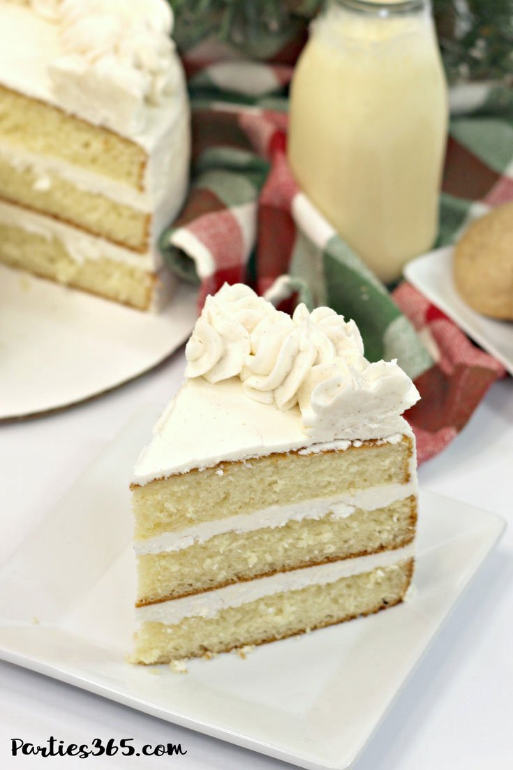 slice of christmas eggnog cake on white plate