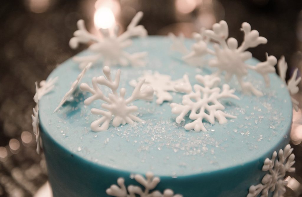 winter cake covered in white snowflakes