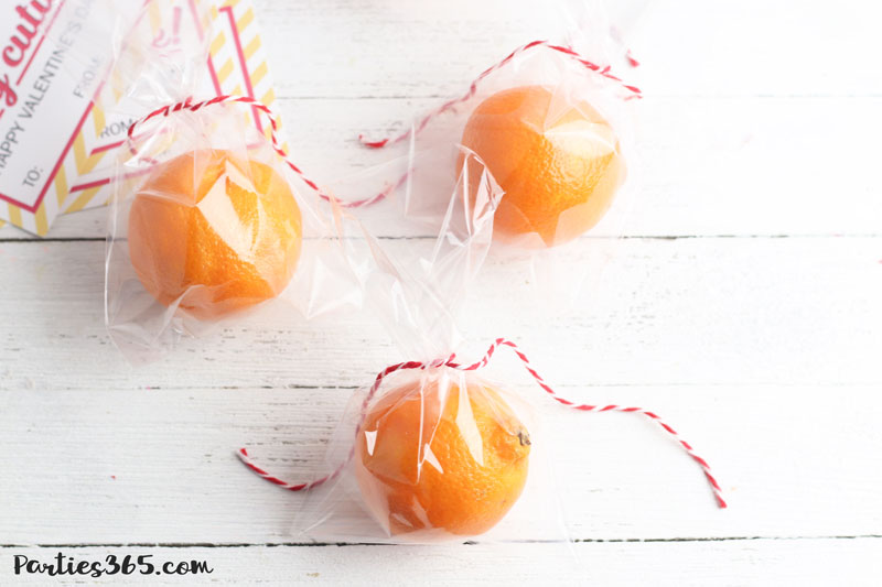 clementine oranges in treat bags tied with baker's twine