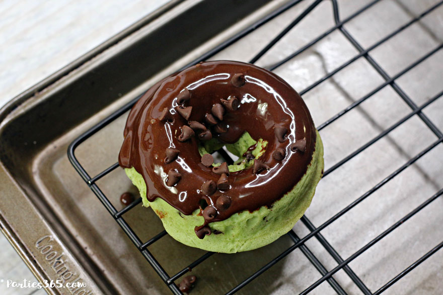 mint chocolate chip donut covered in chocolate ganache and mini chocolate chips