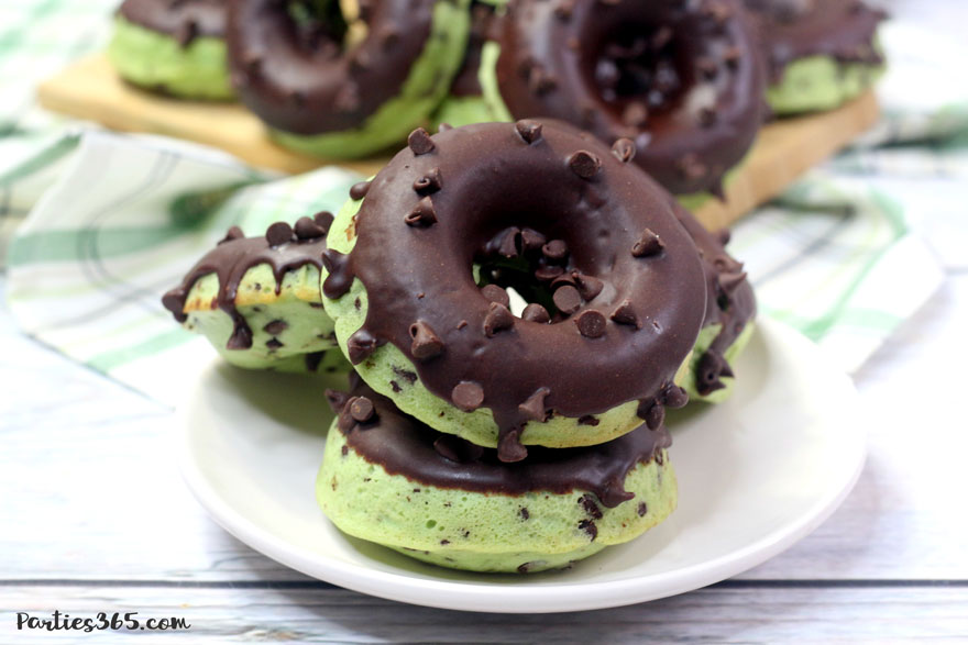 stack of mint donuts with chocolate ganache glaze