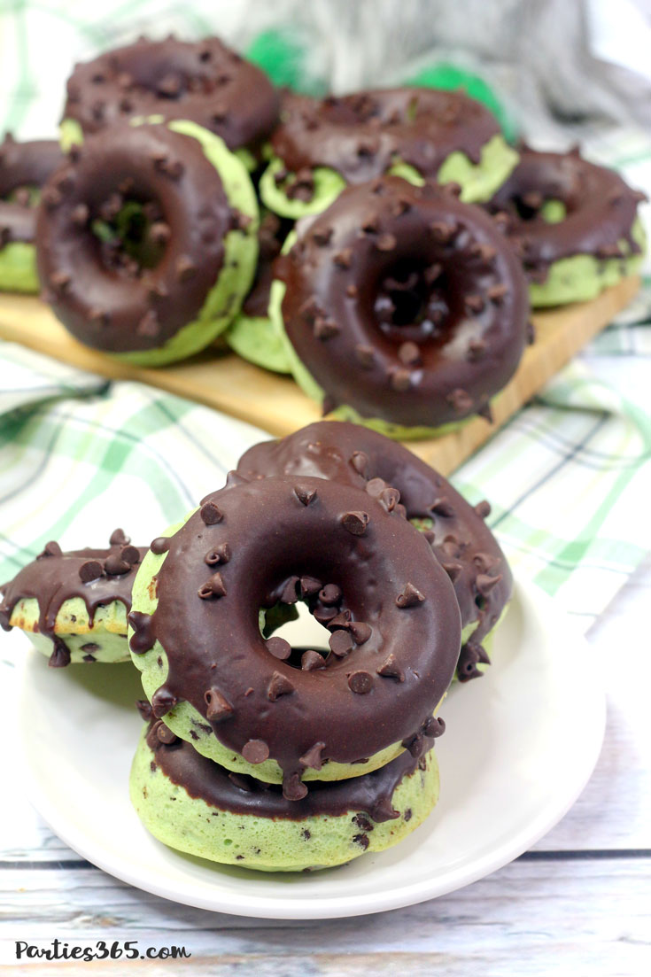 stack of mint chocolate chip donuts covered in chocolate ganache