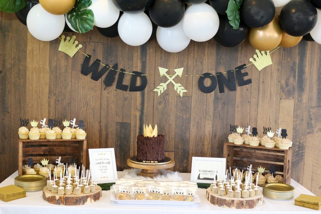 Where the Wild Things Are is a fabulous 1st birthday party theme! Fun for boys or girls, here are DIY ideas for throwing a Wild ONE first birthday party, including inspiration for your cake, decorations, centerpieces and more! 