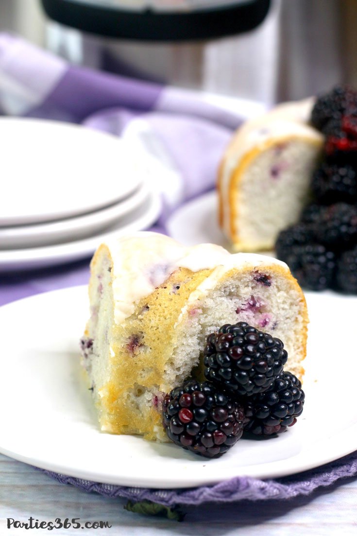 blackberry vanilla bundt cake on a white plate