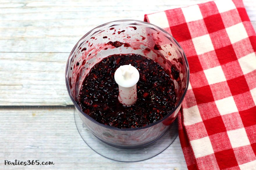 crushed blackberries in a food processor