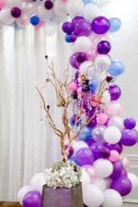 purple and white balloon garland