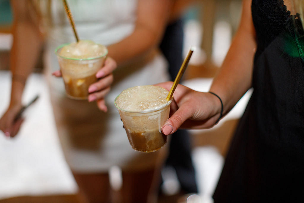 girls holding root beer floats at birthday party