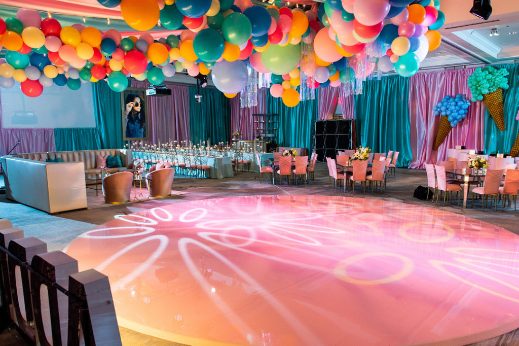 dance floor with balloon installation above at bat mitzvah