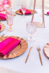 rose gold and hot pink place setting at baby shower