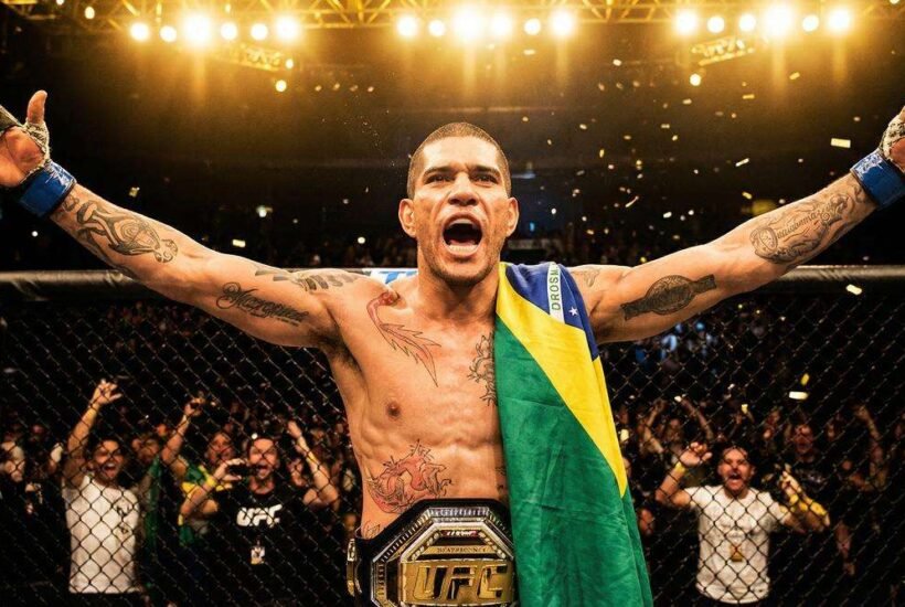 Charles Oliveira celebrating a UFC victory with the Brazilian flag, representing his journey from the favela to fortune
