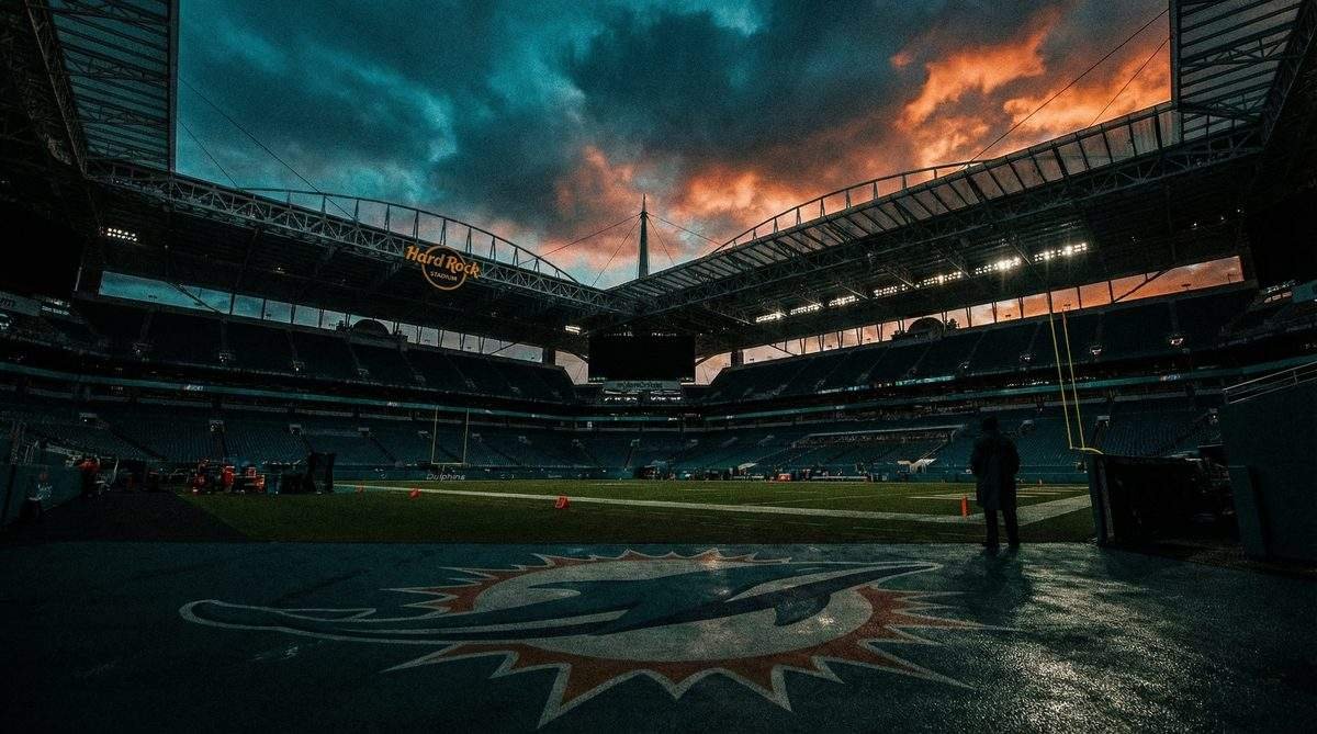 Hard Rock Stadium at dusk, home of the Miami Dolphins, under a dramatic stormy sky