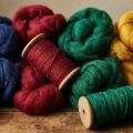 Vibrant colored raw wool fibers and yarn spools representing the dyed-in-the-wool idiom