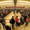 A long TSA security line at an airport, illustrating the impact of the government shutdown on travel.
