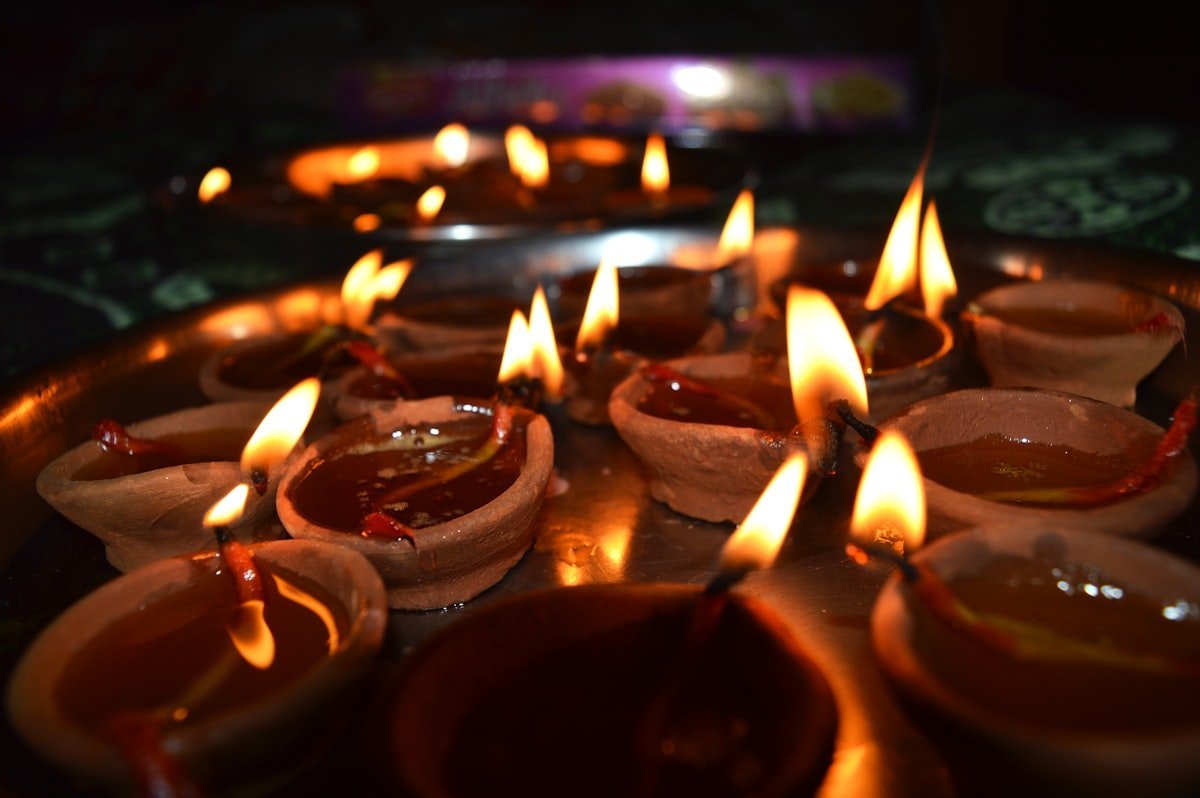 Clay diya lamps lit for Diwali, the festival window chosen as the Ramayana movie release date in 2026