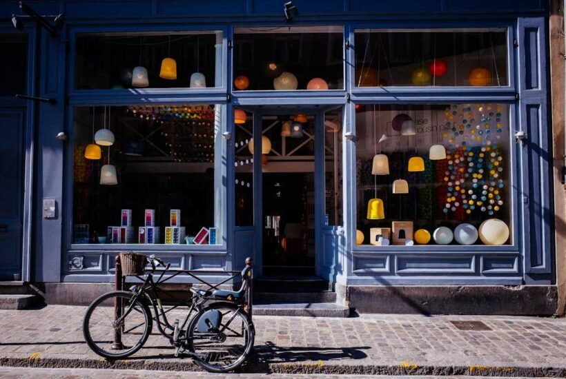 A local storefront with a bicycle parked outside, the neighborhood-scale trade that craigslist like sites are built around