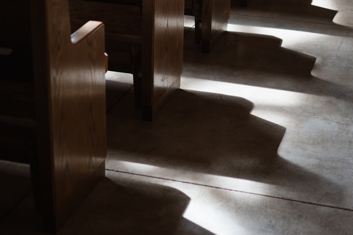 Toni Collier ex husband story of a very public church divorce, told through light falling across empty pews