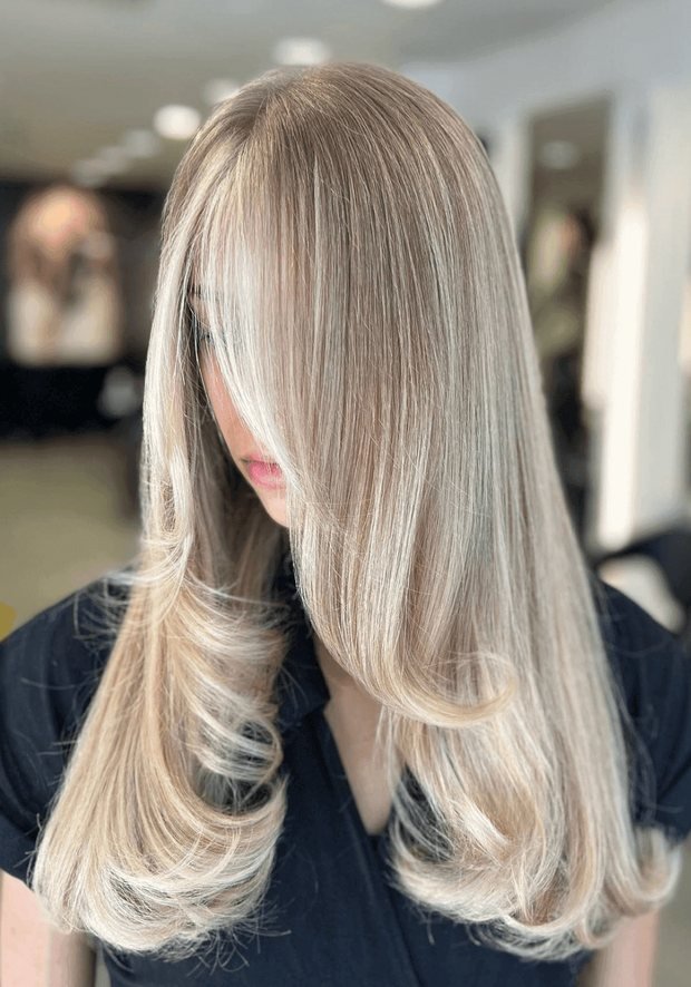 Long straight hair with light blonde half head highlights and face-framing pieces, a Rush Hair & Beauty photo