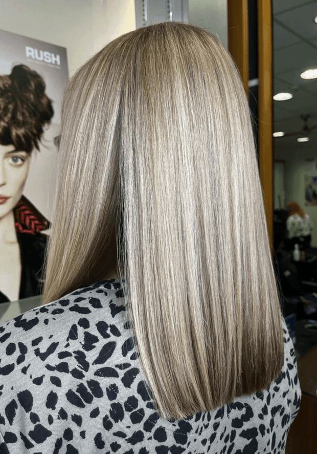 Straight shoulder-length ash-blonde lob from behind after a cut and finish, a Rush Hair & Beauty photo