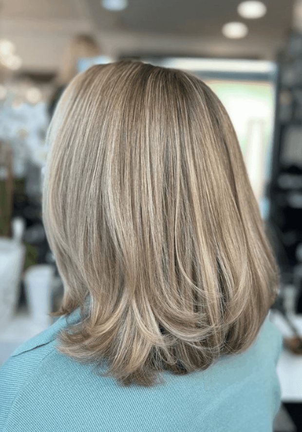 Shoulder-length hair from behind with fine ash-blonde T-section highlights, a Rush Hair & Beauty photo